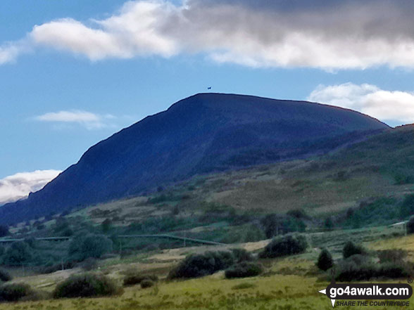 Helicopter hovering above Pen Llithrig y Wrach from Cwm Afon Ddu