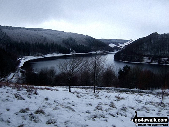 Ladybower Reservoir from Wiseman Hey Clough Woods, Winhill Pike (Win Hill) in heavy snow