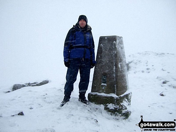 Walk d271 Winhill Pike (Win Hill) from Yorkshire Bridge - Carl 'Mozzer' Morris on the summit of Winhill Pike (Win Hill) during a blizzard