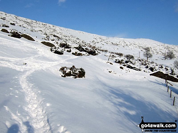 Looking back up to Hollins Cross from near Mam Farm under a blanket of deep snow 