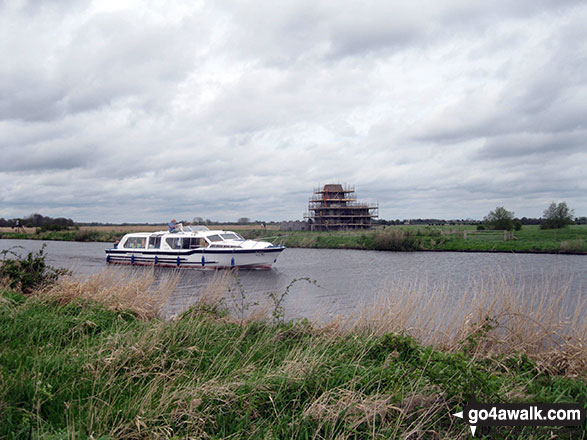 Walk nf117 The River Bure from South Walsham Broad (Pilson Green) - Pleasure craft on the River Bure with St Benet's Abbey Drainage Mill beyond