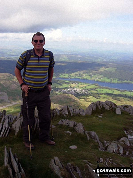 On The Old Man of Coniston A great walk on a fine day from the village to top of The Old Man of Coniston. 2,634 feet (803m) high. Coniston Water in the picture down below.