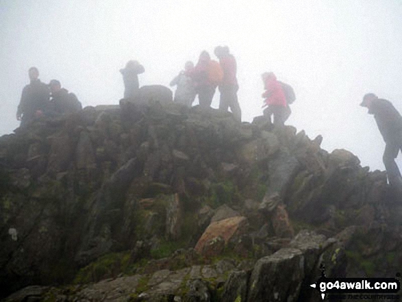 Walk gw100 Mount Snowdon (Yr Wyddfa) from Pen-y-Pass - This is a pic of my boyfriend mounting the steps to the summit of Snowdon in rather foggy conditions!