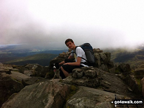 Nick and Jet my dog at the top of Schiehallion Typical weather I'm afraid!