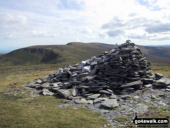 Cadair Bronwen summit cairn with Cadair Berwyn and Moel Sych in the background