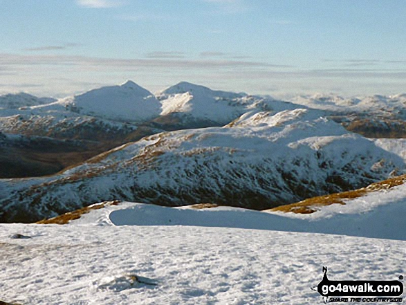 Walk st136 Ben Ledi from Pass of Leny - Snow on the distant Stob Binnein and Ben More from Ben Ledi