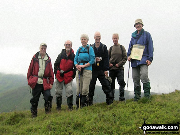 Prime Time walkers on the summit of Craig Rennet 