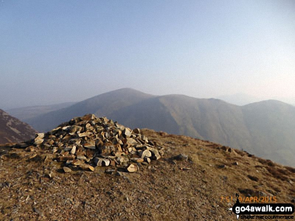 Cairn on Foel Rudd (Mynydd Mawr) with Moel Eilio, Foel Gron and Foel Goch (Snowdon) in the background