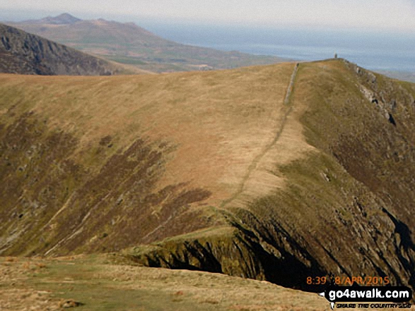 Walk gw188 The first part of the Nantlle Ridge from Rhyd-Ddu - The Hiatus (bottom centre), Mynydd Tal-y-mignedd (far right) and Yr Eifl (The Rivals) on the Llyn peninsula (top far left) from Trum y Ddysgl