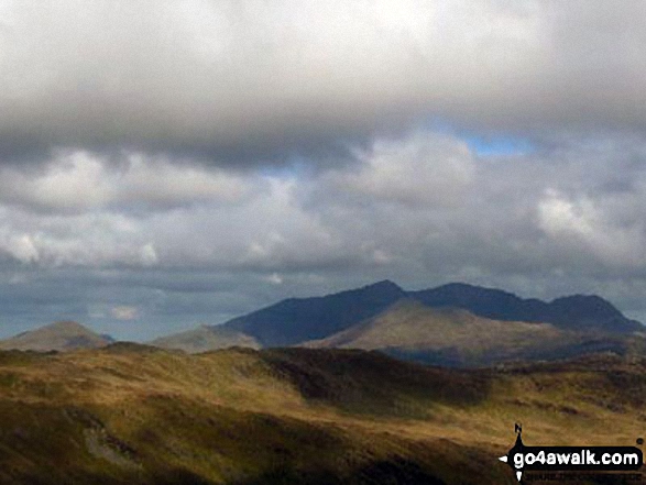 The Snowdon Massif - Yr Aran (far left in sunlight), Snowdon (Yr Wyddfa), Y Lliwedd (in sunlight), Garnedd Ugain (Crib y Ddysgl) and Crib Goch - from Allt-fawr (Moelwyns)