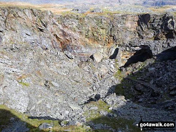 Walk gw224 Cnicht, Hafod-yr-Hydd and Moelwyn Mawr from Croesor - One of 2 Large holes at Rhosydd Quarry