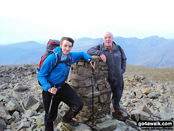 Walk c111 Scafell Pike from Wasdale Head, Wast Water - Nick & Gerry on a windy day at Scafell Pike summit