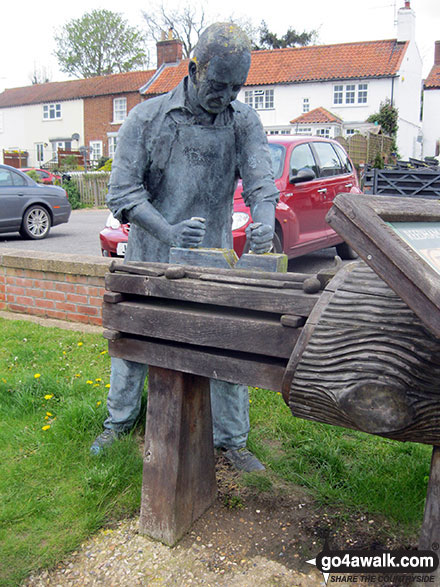 Walk nf160 Berney Mill from Reedham - Sculpture of a traditional boatbuilder craftsman in Reedham