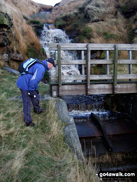 Walk wy106 West Nab and Horseley Head Moss from Meltham - My mate Mike inpspecting Drainwater Workings on Binn Moor