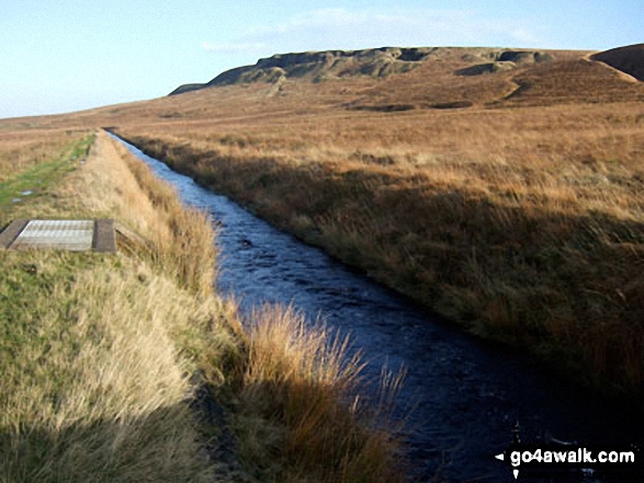 Walk wy106 West Nab and Horseley Head Moss from Meltham - The (now suddenly full) Drainwater Ditch on Binn Moor with Shooters Nab beyond