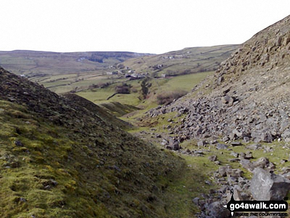 Down through the spoil heaps of Fell End Lead Mine at the NW end of Fremington Edge 