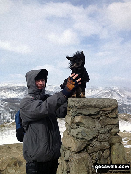 Walk c232 Loughrigg Fell from Ambleside - My partner Anthony and our lovely dog Cookie on top of Loughrigg Fell on a blustery Sunday