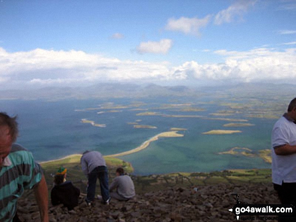 The view from Croagh Patrick (Cruach Phadraig or The Reek) Photo taken on the day when 10,000 pilgrims walk up the mountain. People were walking in bare feet and even carrying up their grannies. An amazing walk that happens once a year and has probably been happening for years and years.