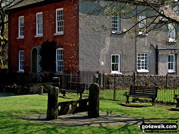 Walk d275 Foolow, Bretton Clough and Sir William Hill from Eyam - The village stocks in Eyam