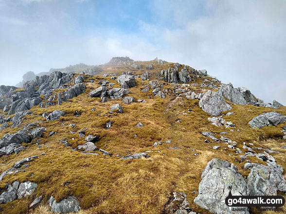 The summit of Sgurr Dhomhnuill during a brief break in the clag