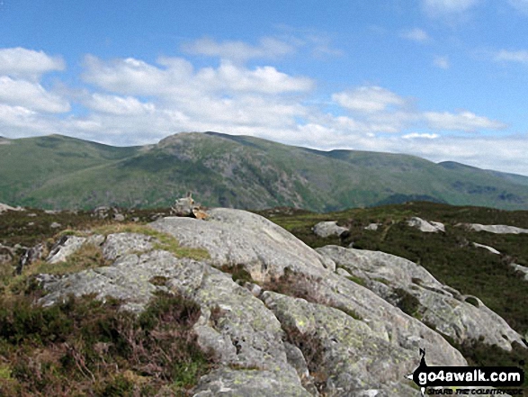 Armboth Fell summit with The Helvellyn massif beyond 