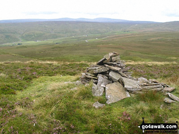 Cairn on western edge of Three Pikes with Viewing Hill beyond 