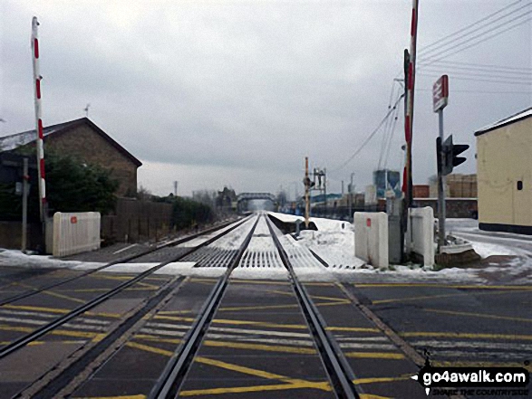 Looking East from the level crossing to Brandon Railway Station in the snow 