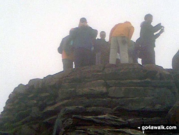 Walk gw117 Snowdon and Yr Aran via The Watkin Path from Bathania, Nantgwynant - This is my husband Dave on the top of Snowdon