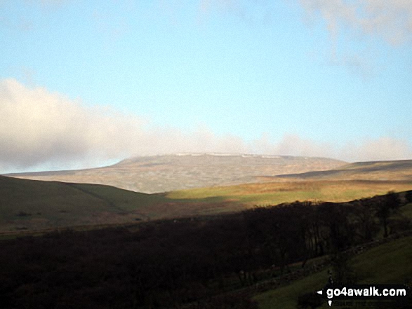 Cloud and snow on Cross Fell from The Pennine Way at Great Rundale Beck