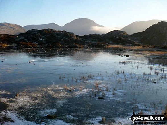 Innominate Tarn on Hay stacks (frozen solid) with Great Gable rising majestically in the background