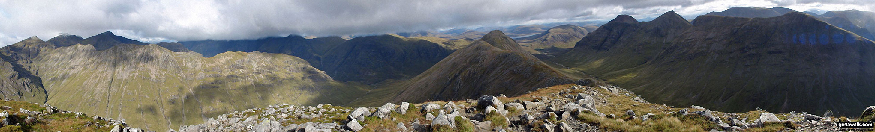 Walk h109 Stob Coire Raineach (Buachaille Etive Beag) and Buachaille Etive Beag (Stob Dubh) via Lairig Eilde from The Pass of Glencoe - Stob Coire Sgreamhach (left) & Beinn Fhada (Stob Coire Sgreamhach) (foreground - left) with Bidean nam Bian & Stob Coire nam Beith (in shadow behind), Stob Coire Raineach (Buachaille Etive Beag) (centre), Buachaille Etive Mor (Stob Dearg), Stob na Doire (Buachaille Etive Mor), Stob Coire Altruim (Buachaille Etive Mor) & Stob na Broige (Buachaille Etive Mor) (right) with Clach Leathad (Creise), Creise & Stob A' Ghlais Choire (Creise) behind from the summit of Buachaille Etive Beag (Stob Dubh)