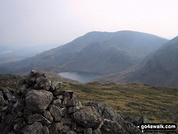 Levers Water and The Old Man of Coniston from Black Sails summit cairn 