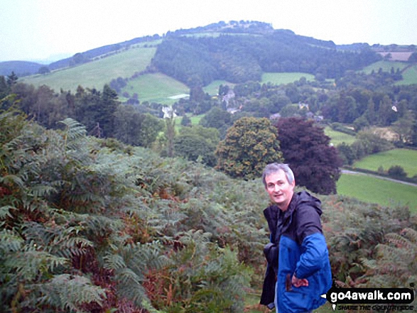 My husband Mark climbing Hopesay Hill with Burrow (Shropshire) in the background He was a lot tireder than he looks!