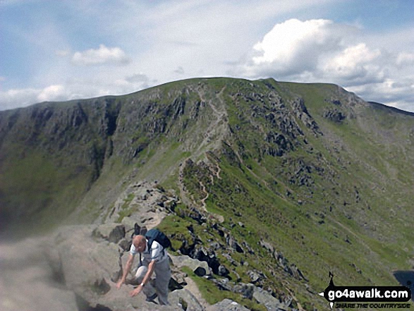 Walk c220 Helvellyn via Striding Edge from Glenridding - Walkers negotiating Striding Edge