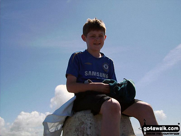 My son Harvey on top of the trig point on Holyhead Mountain 