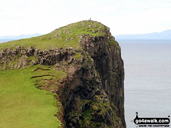 My son checks out the view of the Isle of Harris & Lewis from Neist Point 