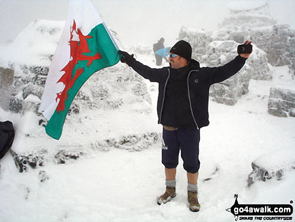 Walk h137 Ben Nevis and Carn Mor Dearg from Achintee, Fort William - Patriot Gary Davies on the summit of Ben Nevis