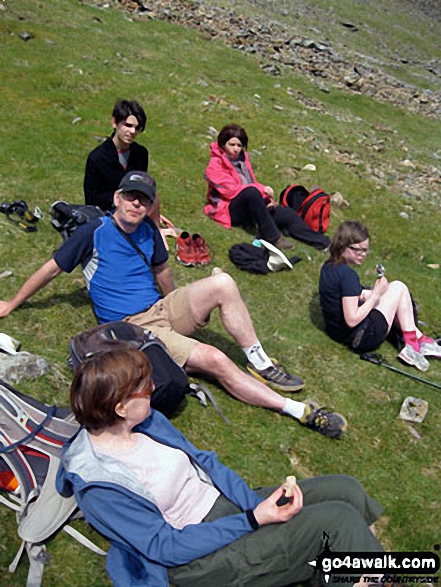 The expeditionists - Tess, Andy, Roman, Sara and Nell take a well-earned break whilst climbing Snowdon via the PYG Track 