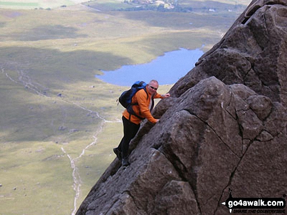 Me dismounting The Cioch (or Cioch Buttress) on the South West ridge of Sgurr Sgumain (Sgurr Alasdair) in The Cuillin Hills, Isle fo Skye