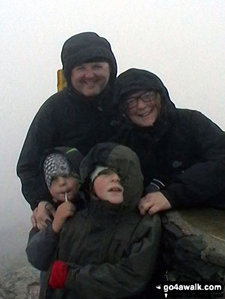 Walk gw126 Snowdon via The Llanberis Path - The Johnson-Holme Family on the summit of Mount Snowdon