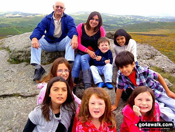 Friends and family just climbed to the top of Haytor Tor It's wild and windy up there!