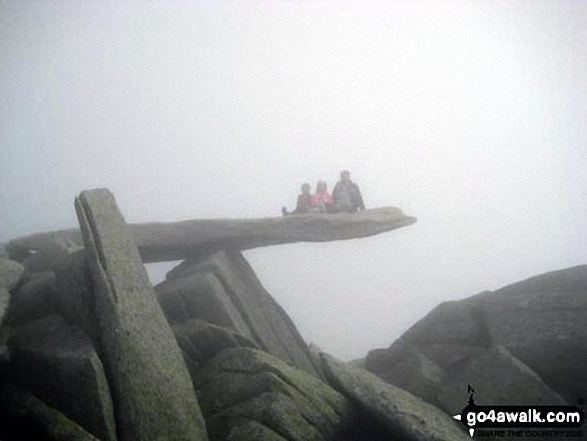 Walk gw102 The Welsh 3000's (Glyderau) from Llanberis - Hubby and kids, YingLi and WingHoi, on the cantilever rock on Glyder Fach in the mist