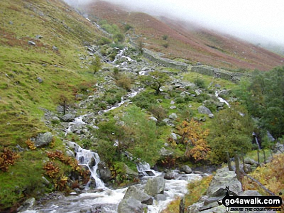 Walk c189 High Raise from Rosthwaite - A beck in spate entering Greenup Gill