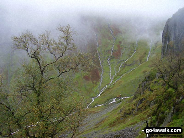 Walk c243 High Raise and Ullscarf from Rosthwaite - Mere Gill, Greenhow Gill and Footmoorgate Gill 'streaming' into Greenup Gill beyond Pounsey Crag (far right) as seen from Eagle Crag