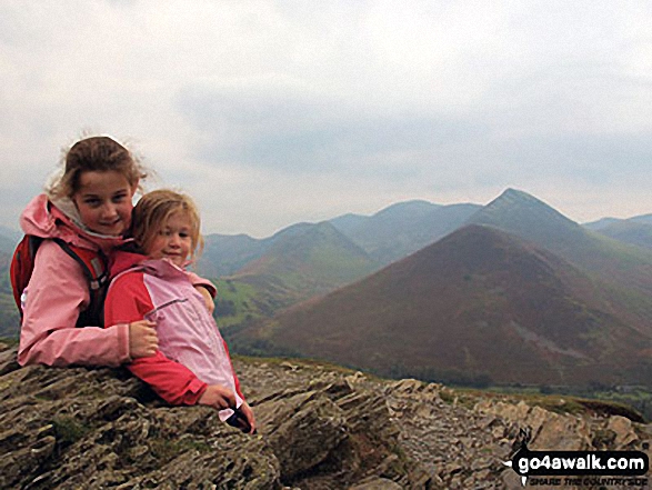 Sofia and Lara on their way up Cat Bells with Causey Pike in the background 