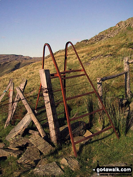 Old rusting ladder stile on the lower slopes of Moelwyn Bach 