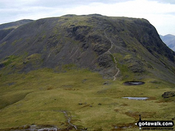 Beck Head and Beckhead Tarn with Kirk Fell beyond from below Westmorland Cairn, Great Gable