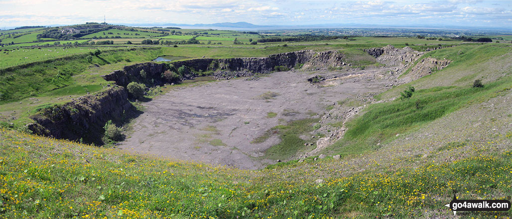 Disused quarry on Clints Crags with Moota Hill (left - with the telecommunications mast on it) beyond