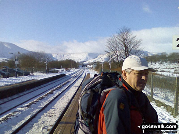 Walk d296 Jacob's Ladder and Kinder Scout from Edale - Mike at Edale Station with Lord's Seat, Cowburn Tunnel and Brown Knoll in the background