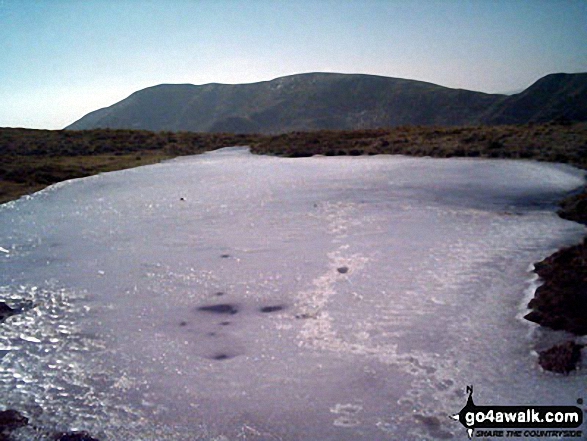 Walk c306 The Old Man of Coniston and Wetherlam from Coniston - A frozen Low Water - with The Old Man of Coniston beyond